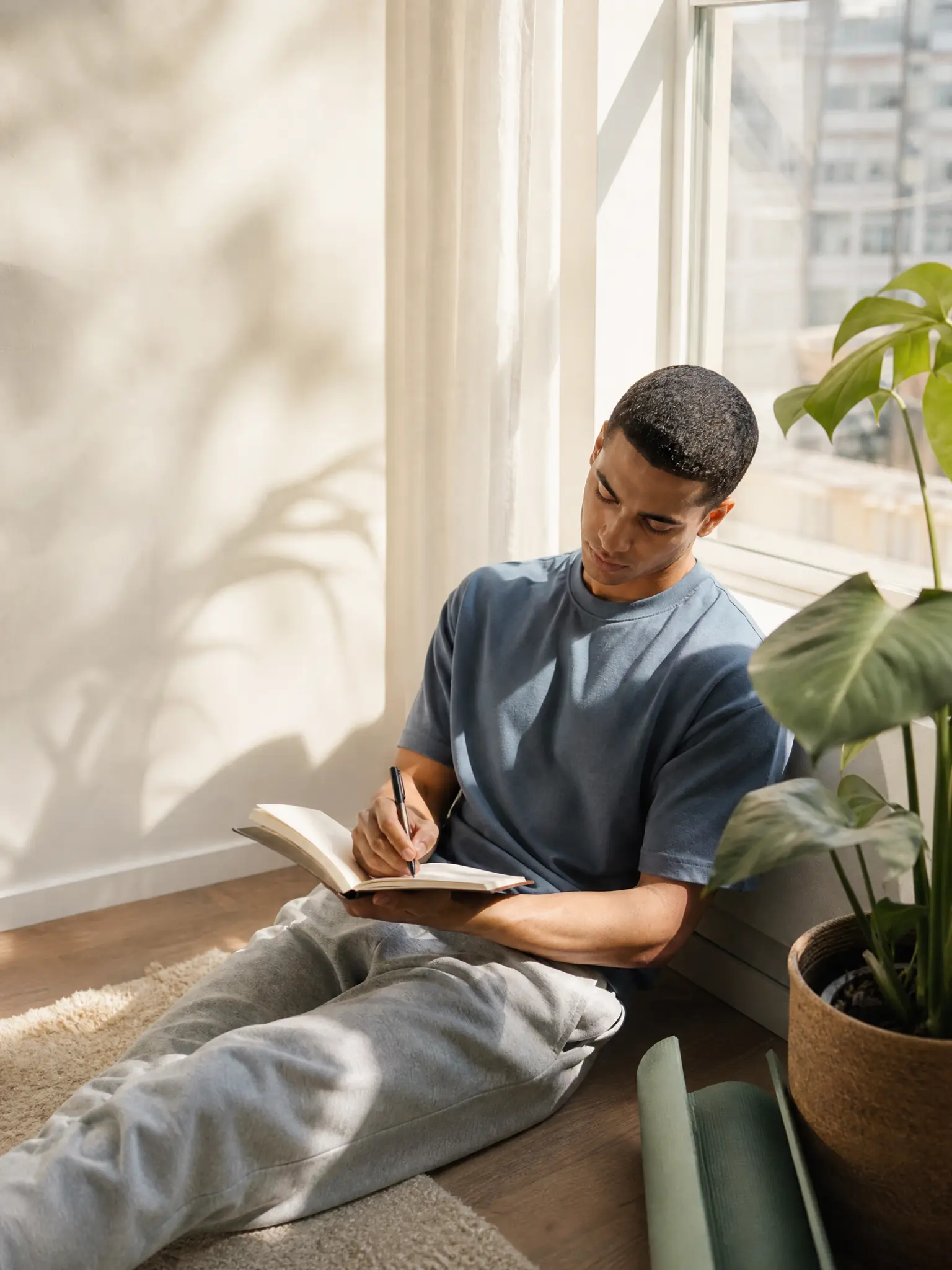 A young adult reflecting on a care routine at home